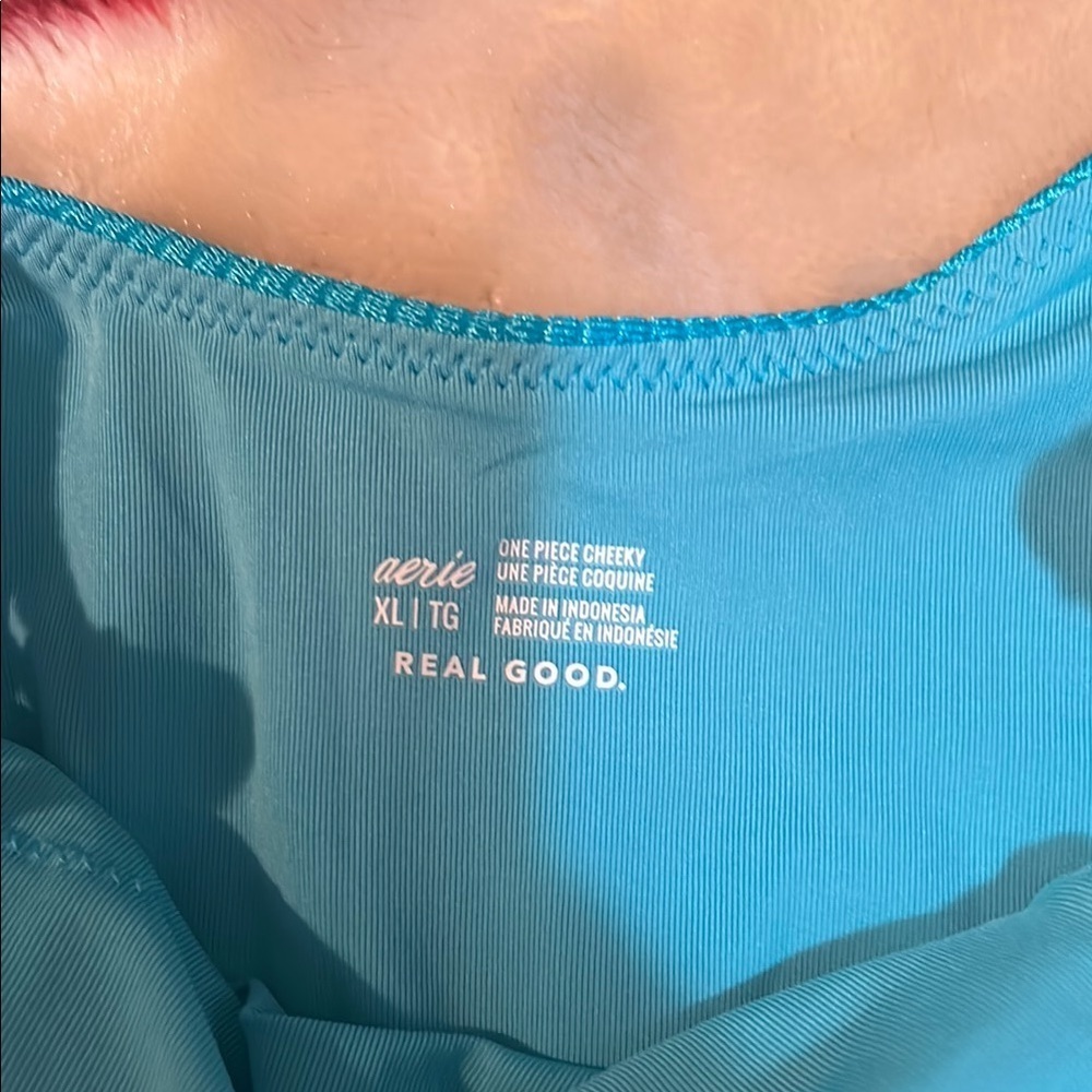 Turquoise Blue One Piece Swimsuit with Plunging Neckline and Cross Back - Picture 2 of 3